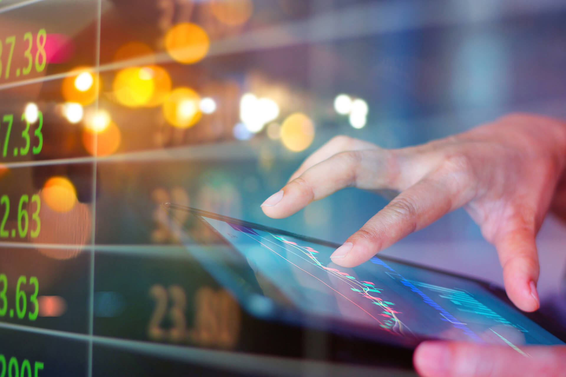Graphic depicting finance with man using iPad with sheets and numbers overlayed