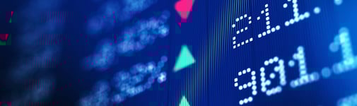 Close up image of stock ticker symbols